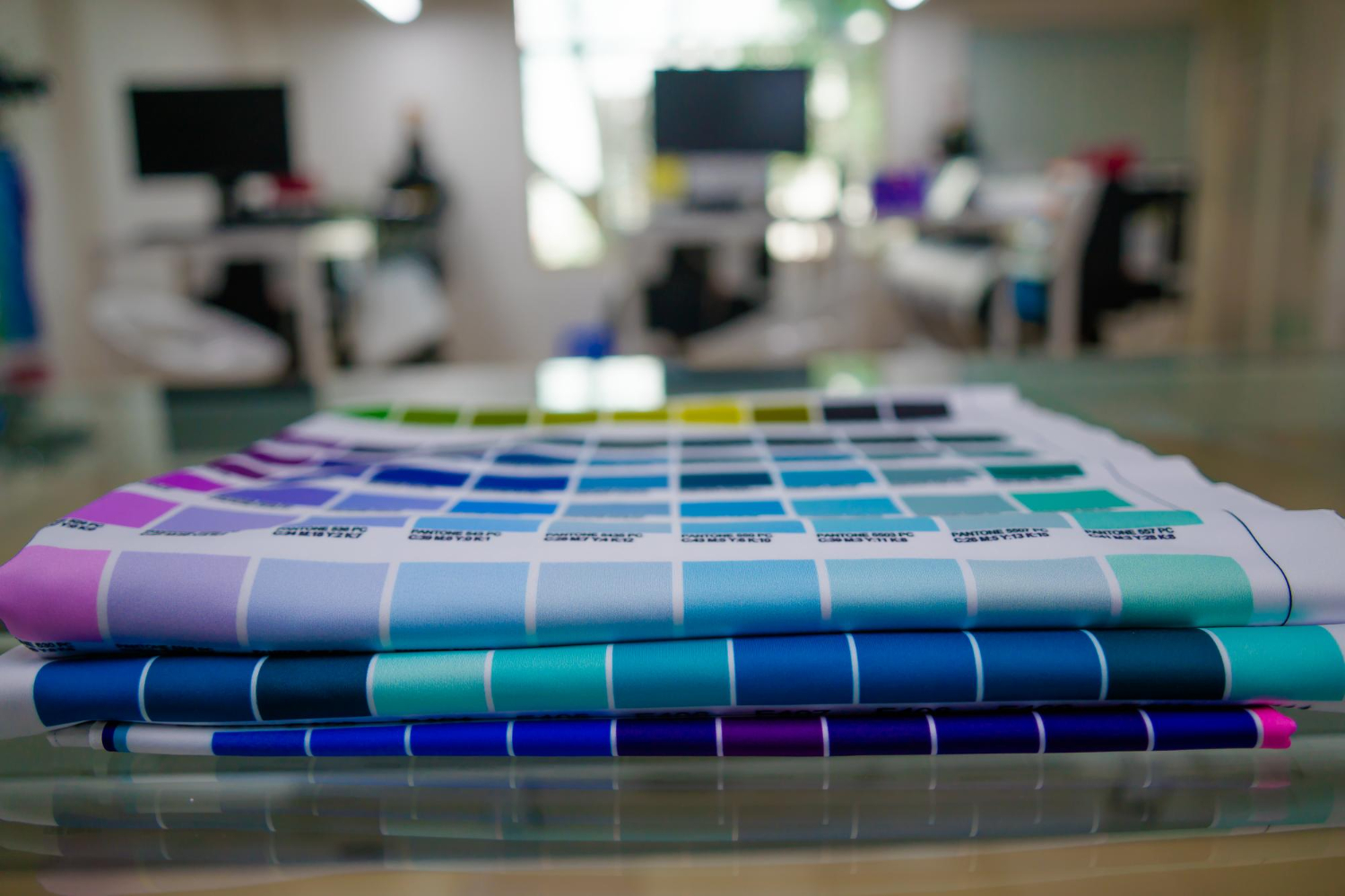 Printed fabrics with color scales, testing colors for sublimation printing.
