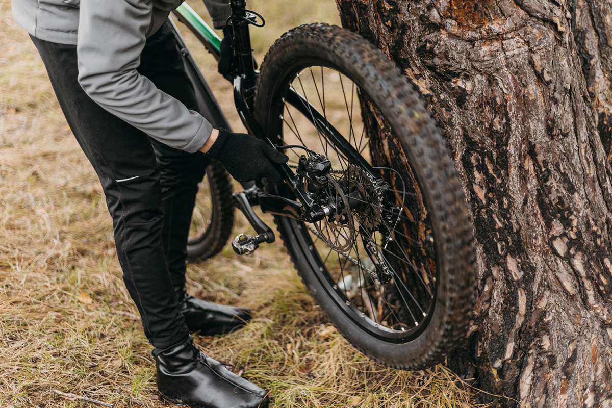 Close-up view of mountain bike tires, comparing tubeless and tubed options