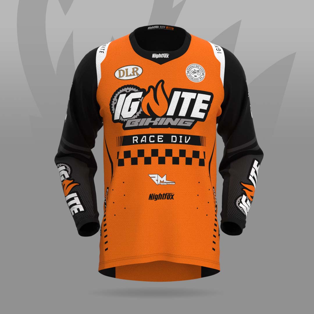 2024 MTB jersey design for Ignite Biking, featuring orange and black colors inspired by the team logo flame.