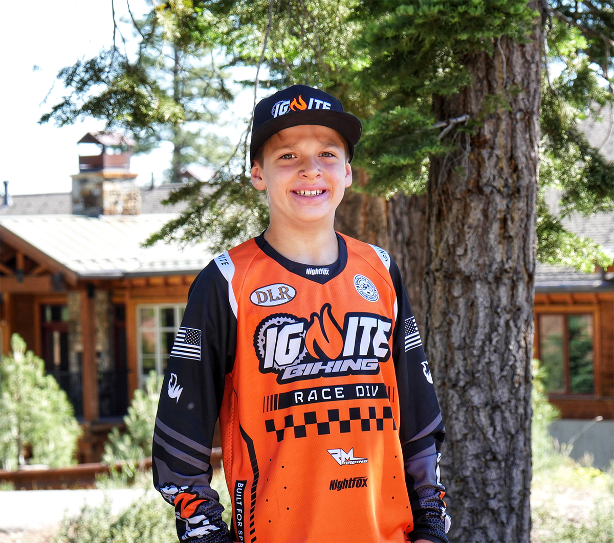 Ignite MTB Team Rider, young kid wearing his new custom jersey on the trails before the race starts.