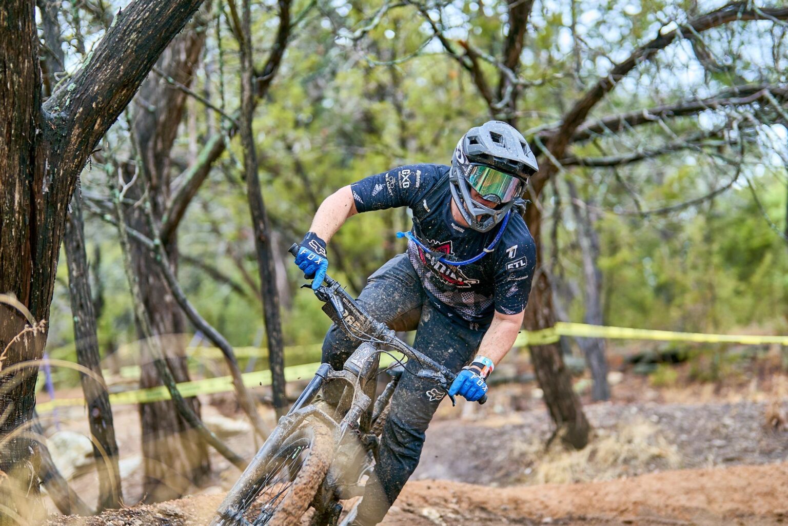 Wreckless Sending rider from Texas in action, wearing a custom MTB jersey made by Nightfox.