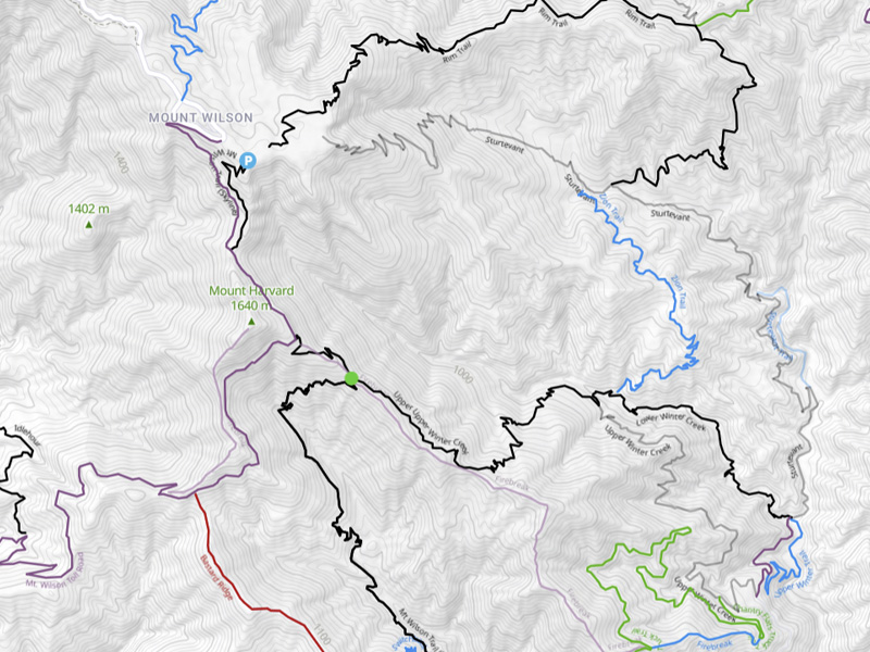 A detailed map of the Mt. Wilson Trail in Pasadena, showing mountain bike routes, elevation profiles, and key landmarks along the trail through the San Gabriel Mountains.