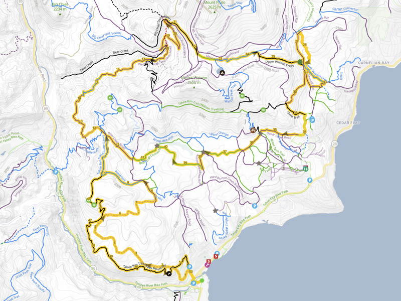 A map of the Tahoe Rim Trail MTB routes, showing various trail segments, elevation changes, and key points around Lake Tahoe.