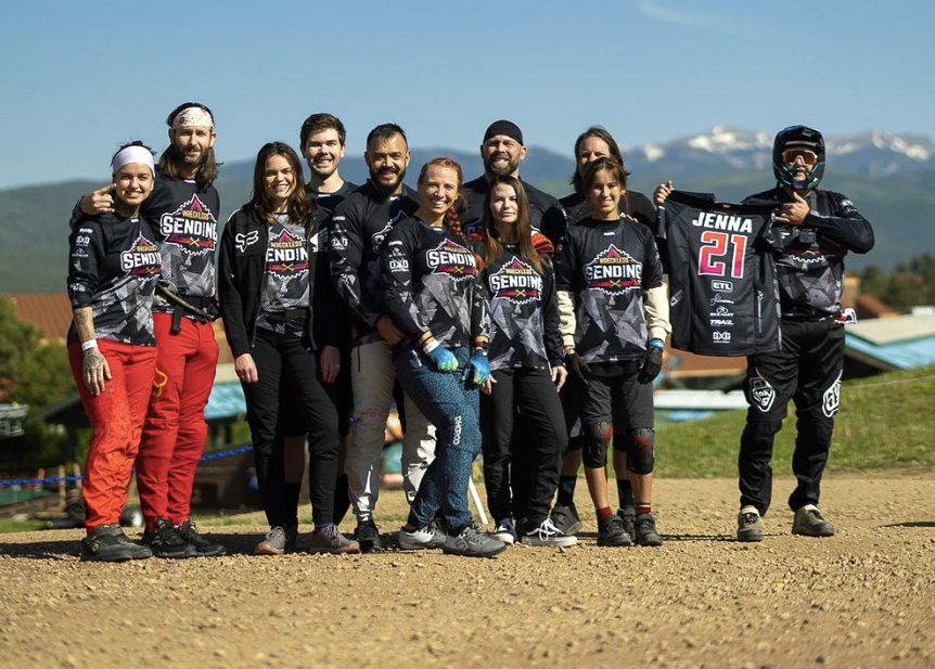 Wreckless Sending team photo with riders wearing their custom MTB jerseys.