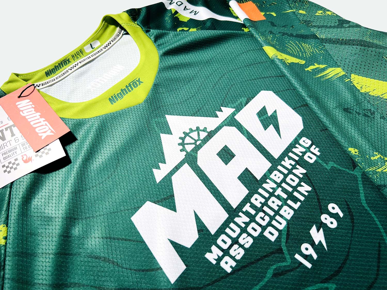 Studio image of Team MAD MTB’s new jersey design, highlighting its premium quality before packaging and delivery to the team.