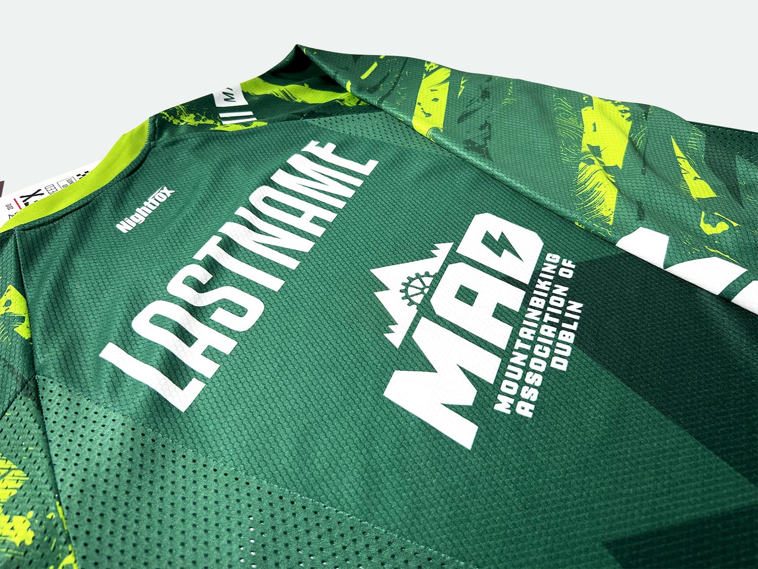 Studio image of Team MAD MTB’s new jersey design, highlighting its premium quality before packaging and delivery to the team.