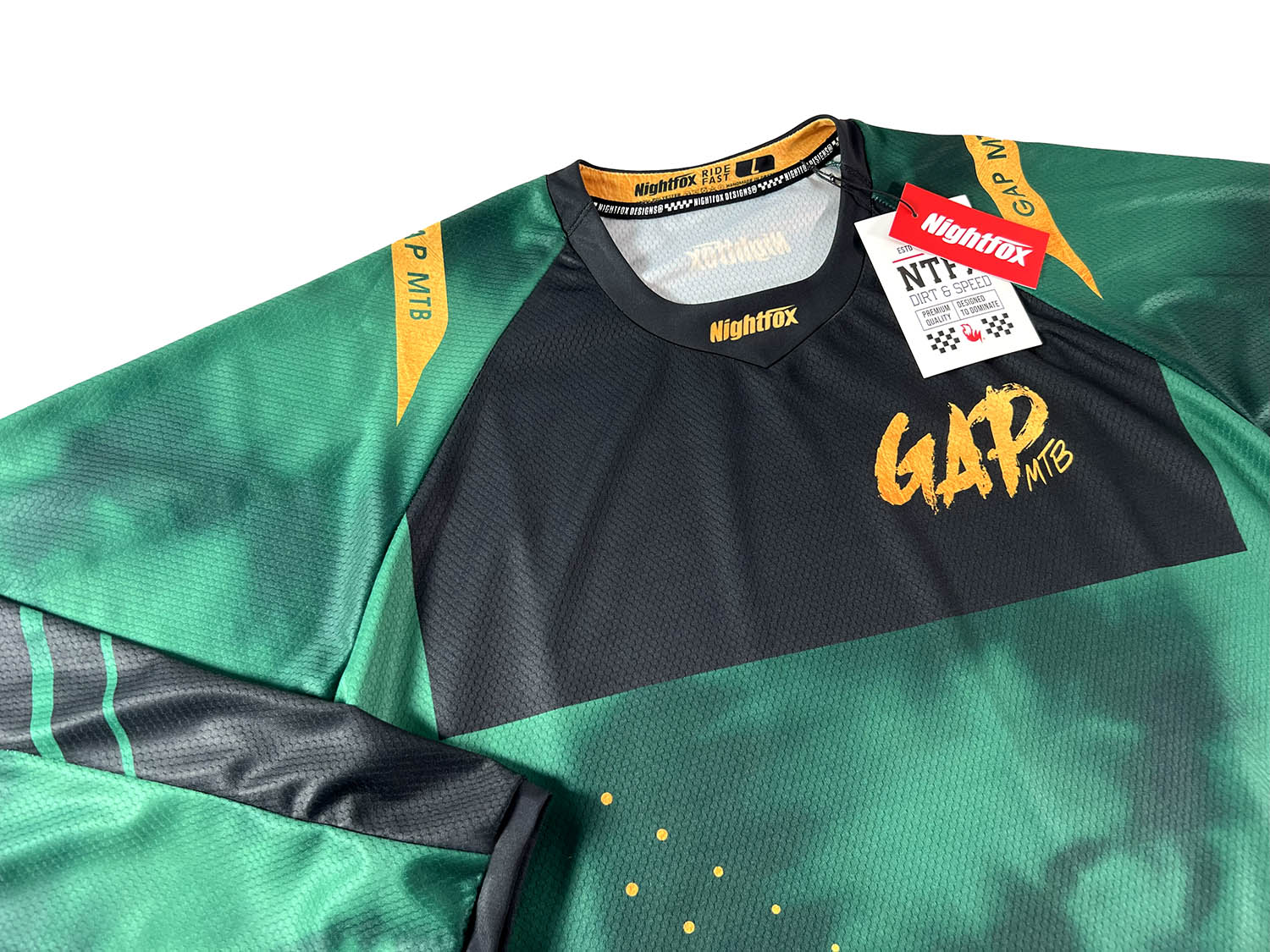 Studio photoshoot of GAP MTB’s new custom jersey, featuring a forest green base with black and gold details, designed by Nightfox for Glencullen Adventure Park, Ireland’s top MTB destination.