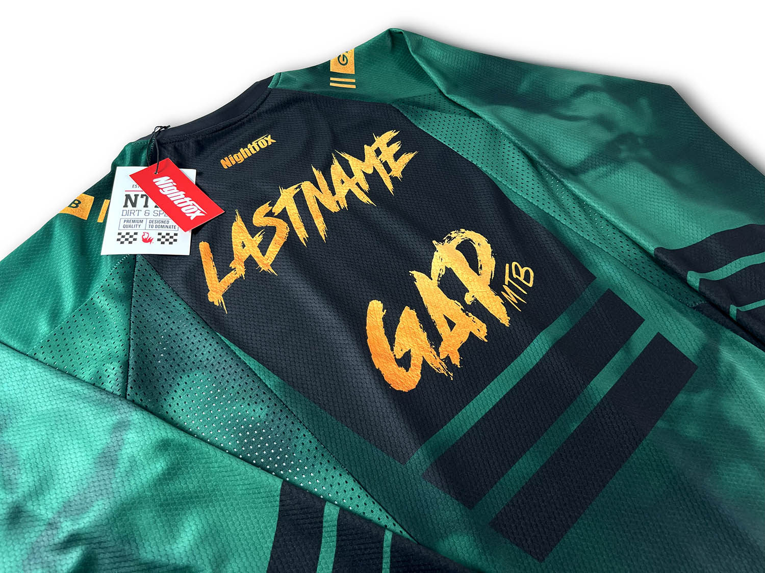 Studio photoshoot of GAP MTB’s new custom jersey, featuring a forest green base with black and gold details, designed by Nightfox for Glencullen Adventure Park, Ireland’s top MTB destination.