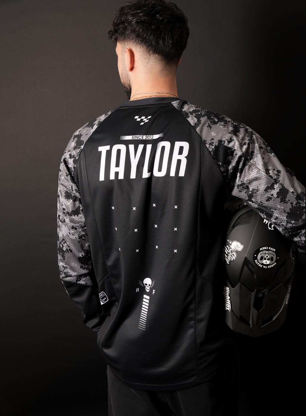 Custom MTB Race Jerseys with Team Logos and Individual Numbers Custom race jerseys for mountain biking teams with printed team logos and individual numbers.